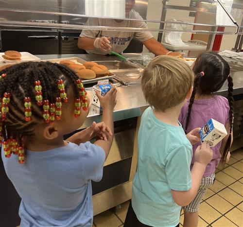 Kids in lunch line at Rainbow Elementary